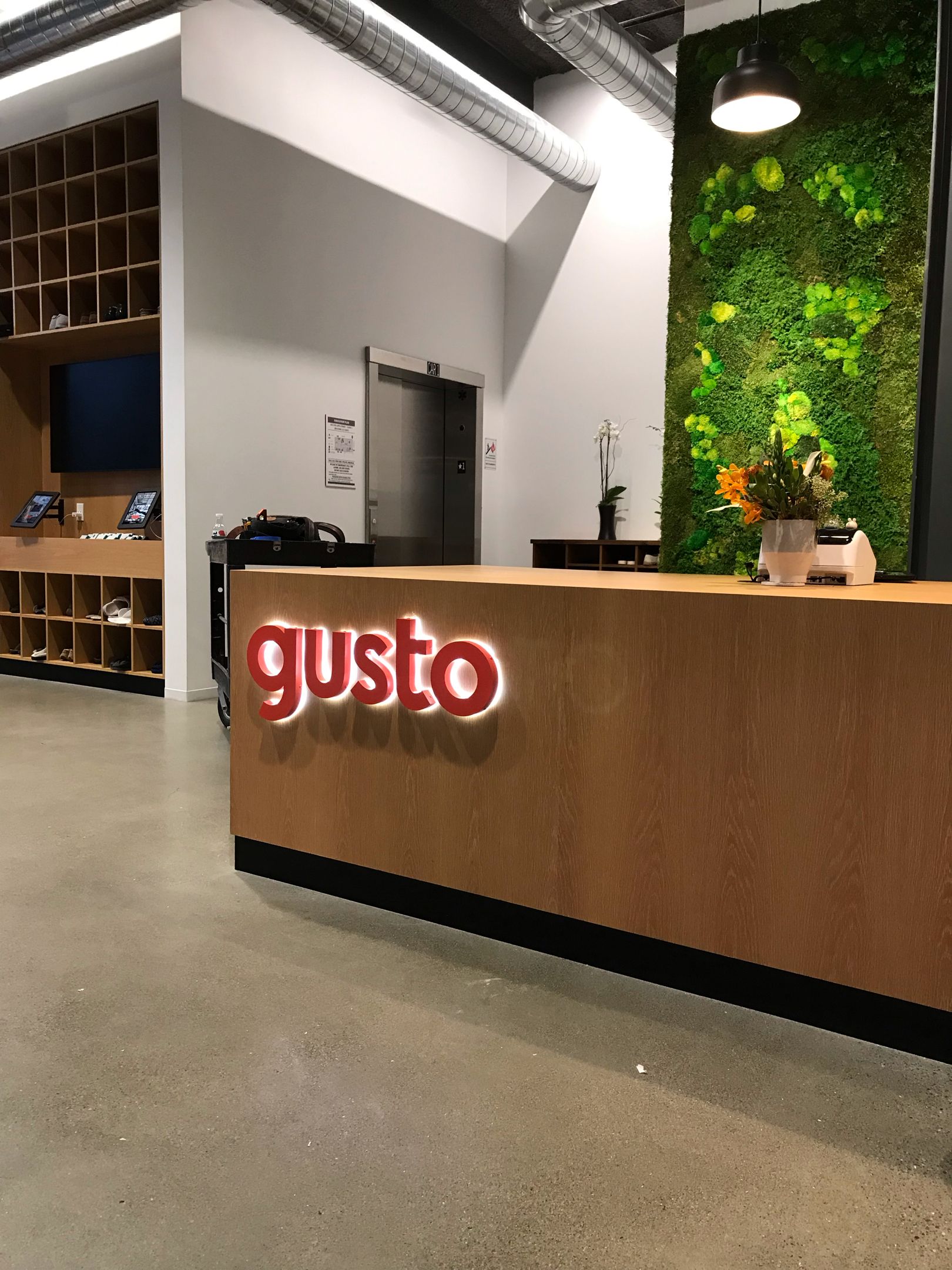 Front desk Gusto HQ San Francisco Halo-lit channel letters